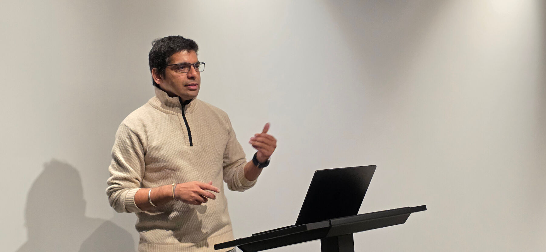 Dr. Raj Hegde delivering a keynote